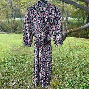 Vintage Breli original Black and floral dress with a belt and pockets no size.